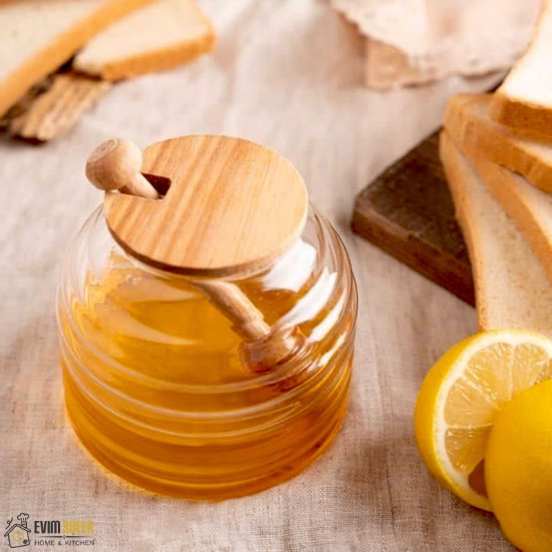 عسل‌خوری شیشه‌ای با درب چوبی